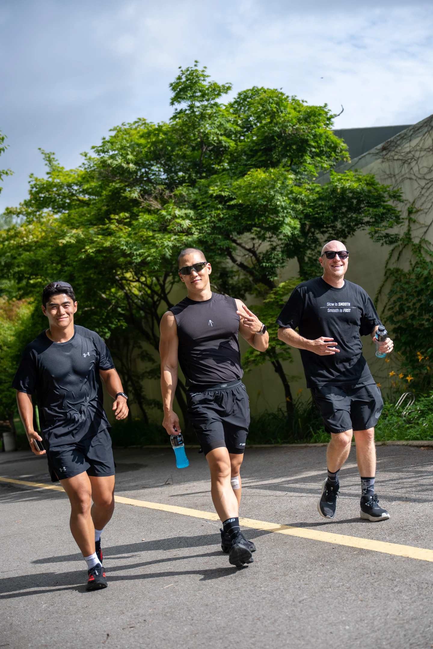 Three RUN N'ICE participants walking toward the finish together